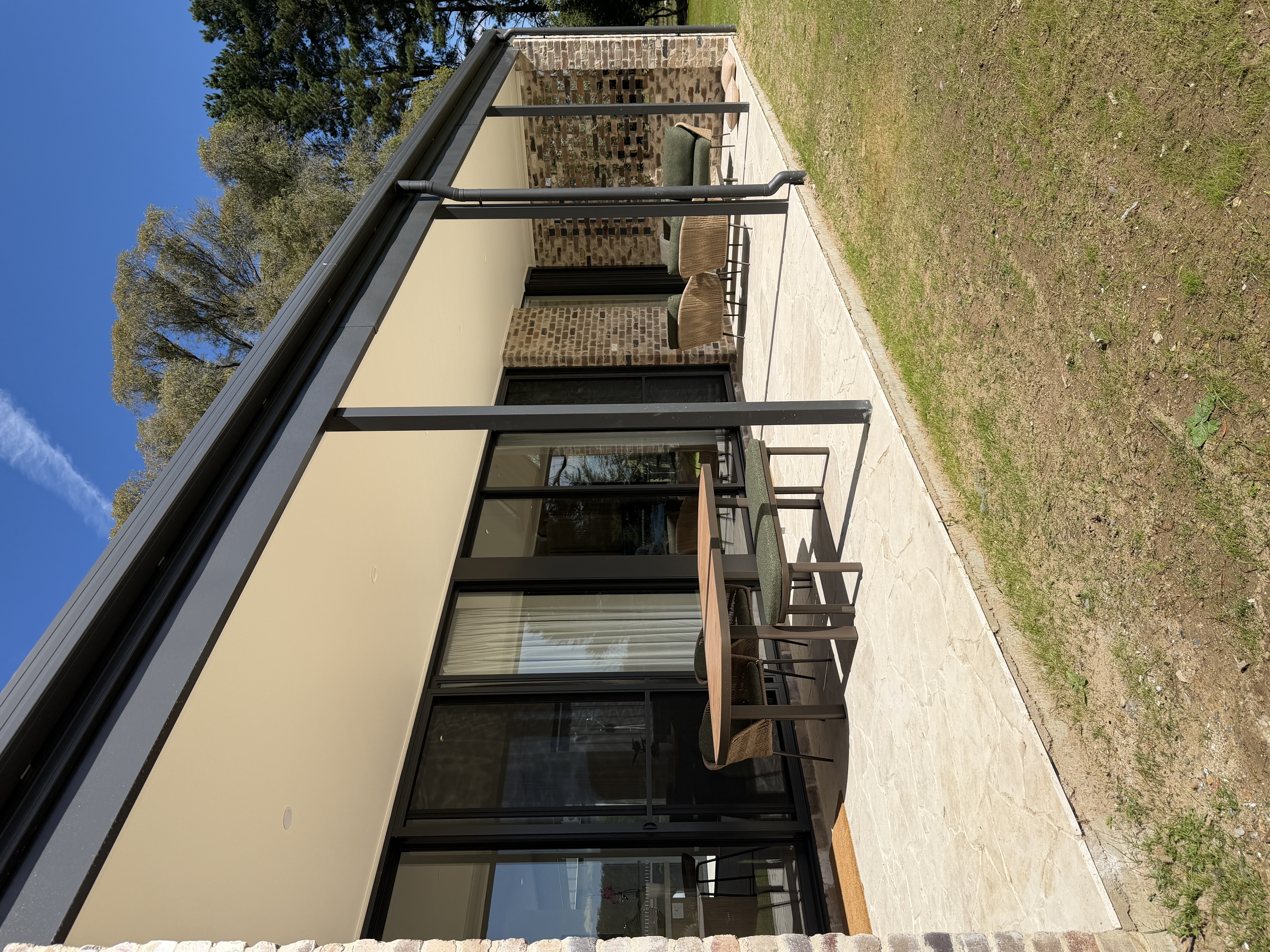 Completed exterior extension with patio lounge